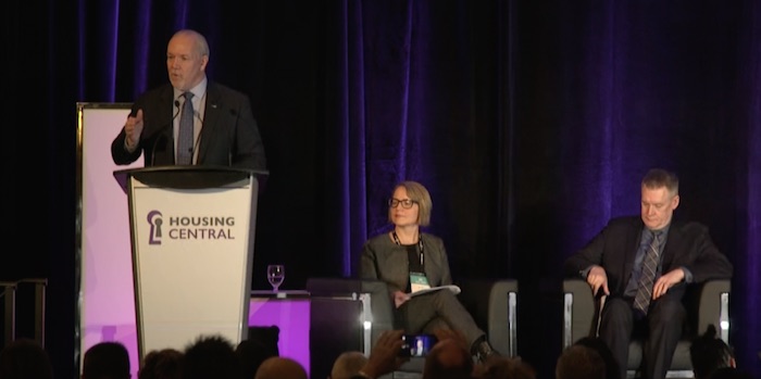Horgan addresses attendees of the Housing Central Conference in Vancouver (Hayley Woodin/Business In Vancouver)