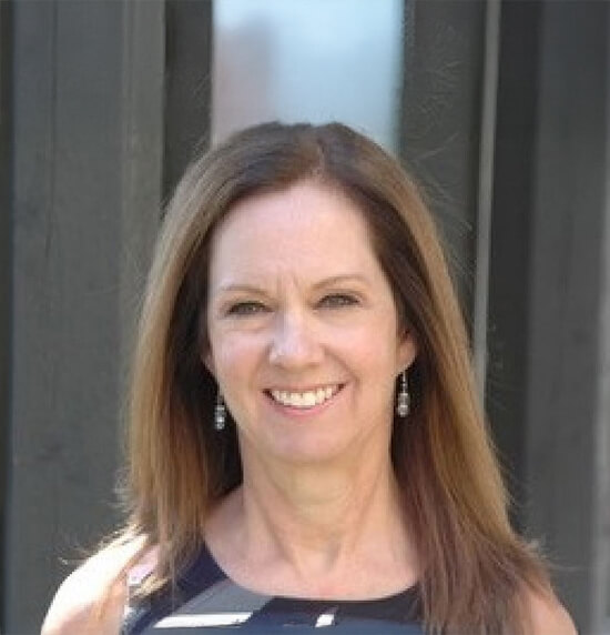 A portrait of Anne Chisholm.