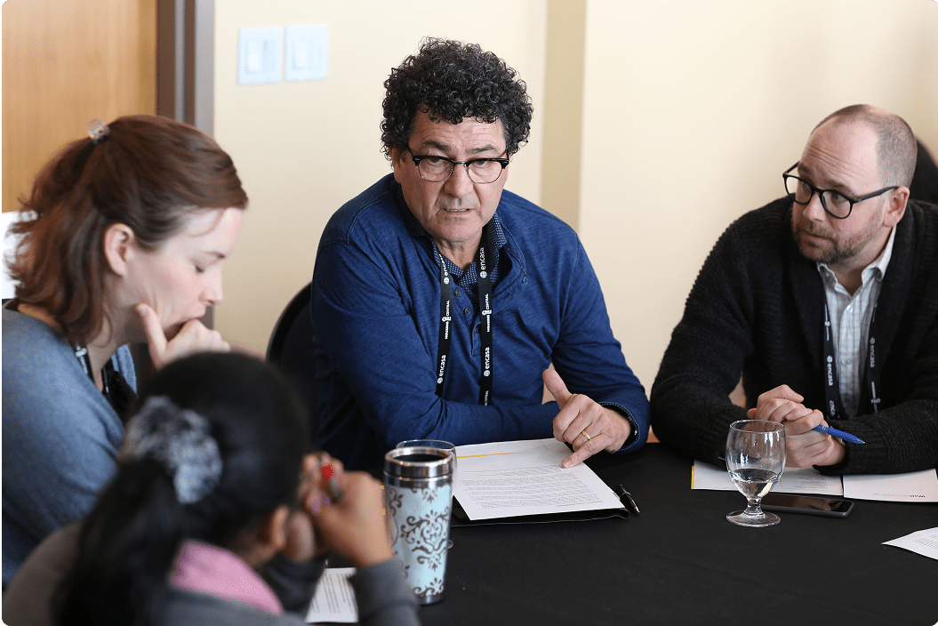 Members of a board discussing issues.