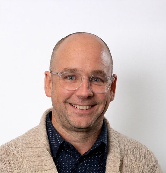 A portrait of Graham Wood.