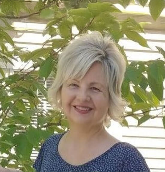 A portrait of Kate Nielsen.
