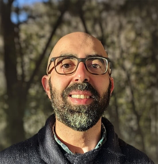 A portrait of Khaled Issa.