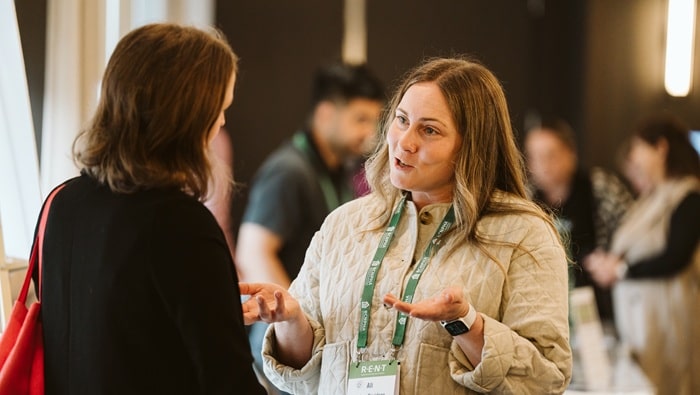 People talking at a conference
