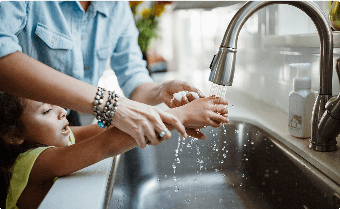 Someone washing their hands.