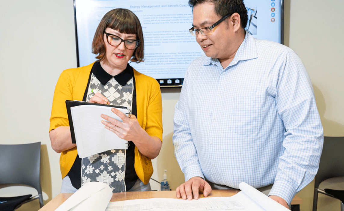 Looking over documents together.